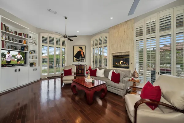 a living room with furniture or couch and a fireplace