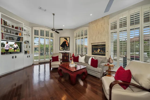 a living room with furniture or couch and a fireplace
