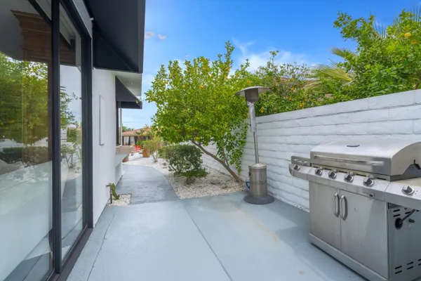 a garden view with a seating space