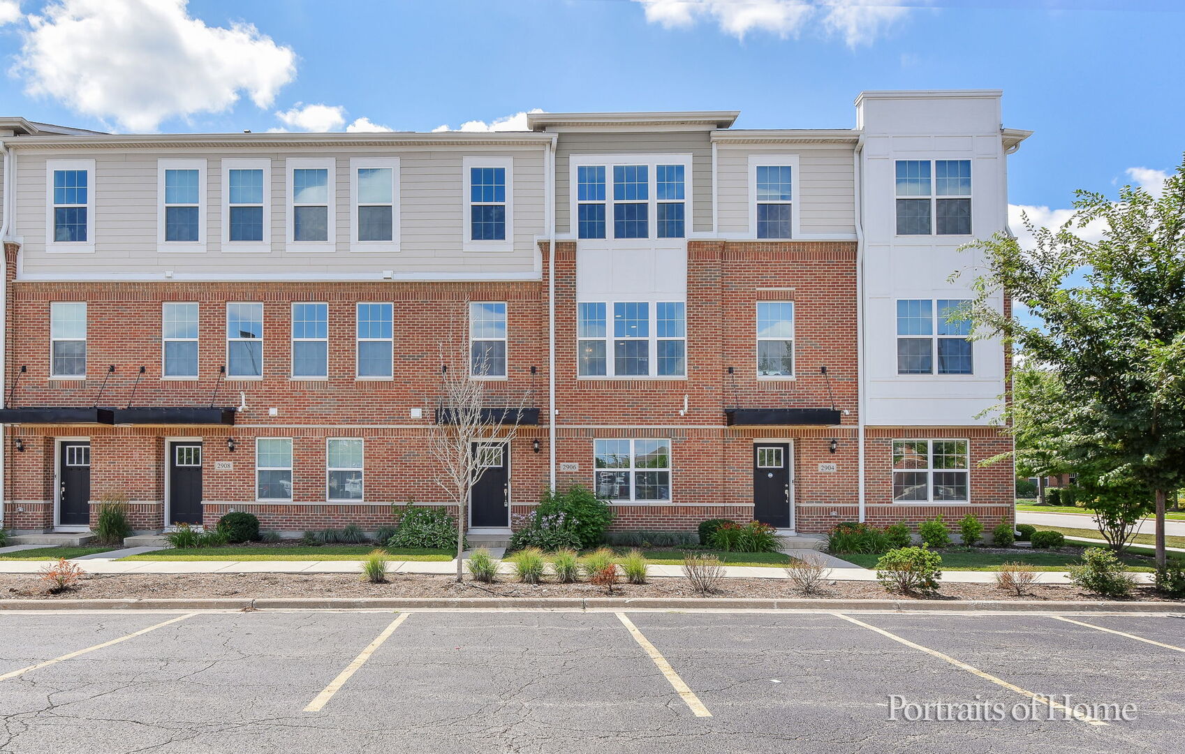 a front view of a building with a street