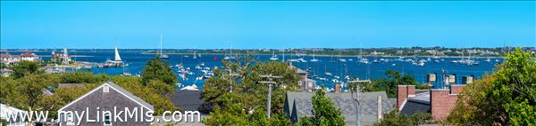 10 Sea Street Nantucket, MA 02554 - Photo 8 of 8 a view of a lake with a house in the background