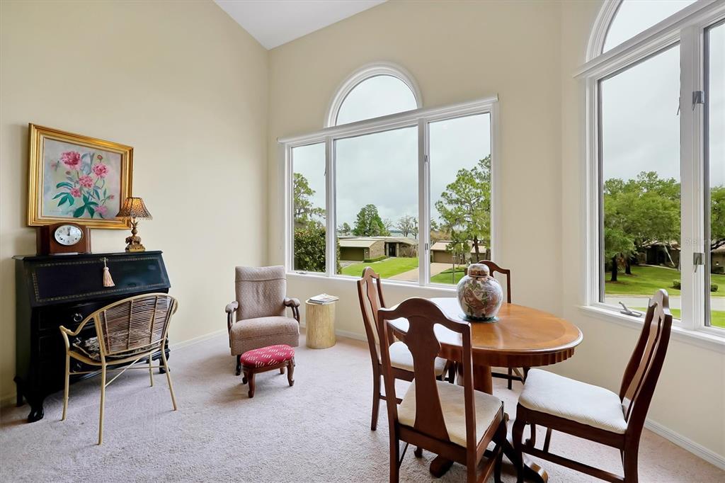 139 Woden Way Winter Haven, FL 33884 - Photo 11 of 60 a view of a dining room with furniture window and outside view