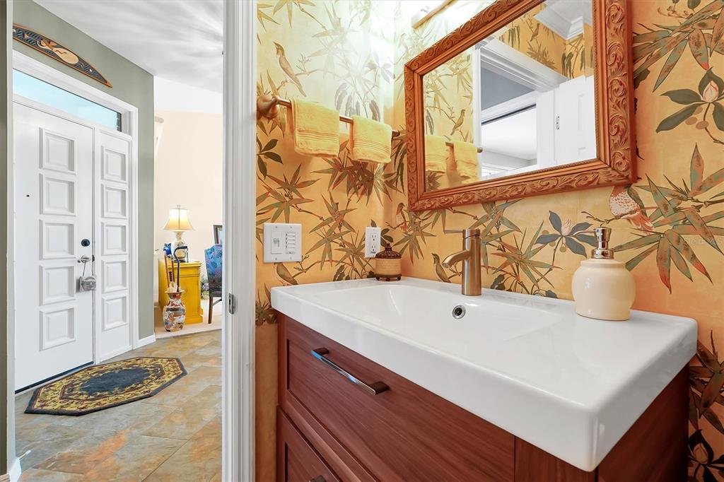 139 Woden Way Winter Haven, FL 33884 - Photo 14 of 60 a bathroom with a sink and a mirror