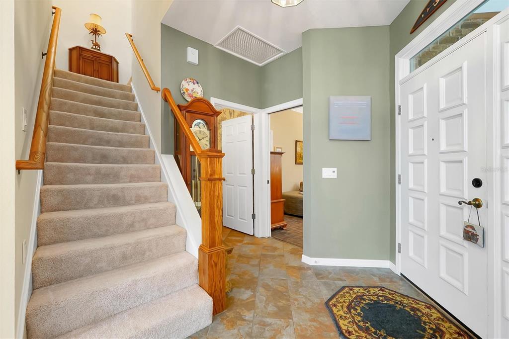 139 Woden Way Winter Haven, FL 33884 - Photo 28 of 60 a view of an entryway with staircase