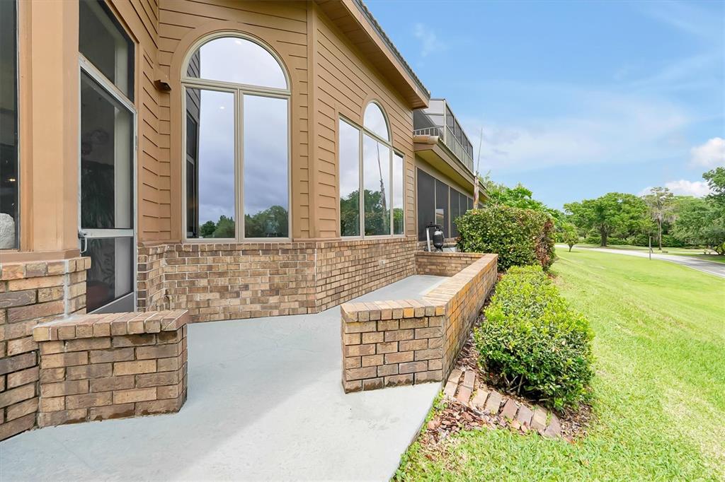 139 Woden Way Winter Haven, FL 33884 - Photo 46 of 60 a front view of a house with a yard