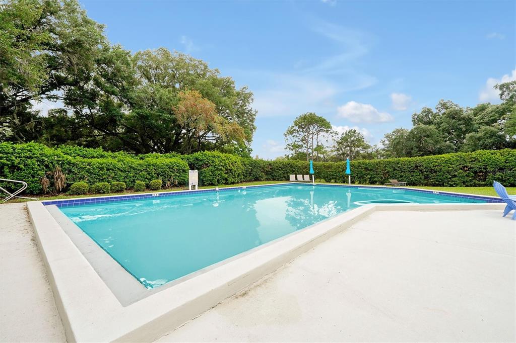 139 Woden Way Winter Haven, FL 33884 - Photo 56 of 60 a view of a garden and basketball court