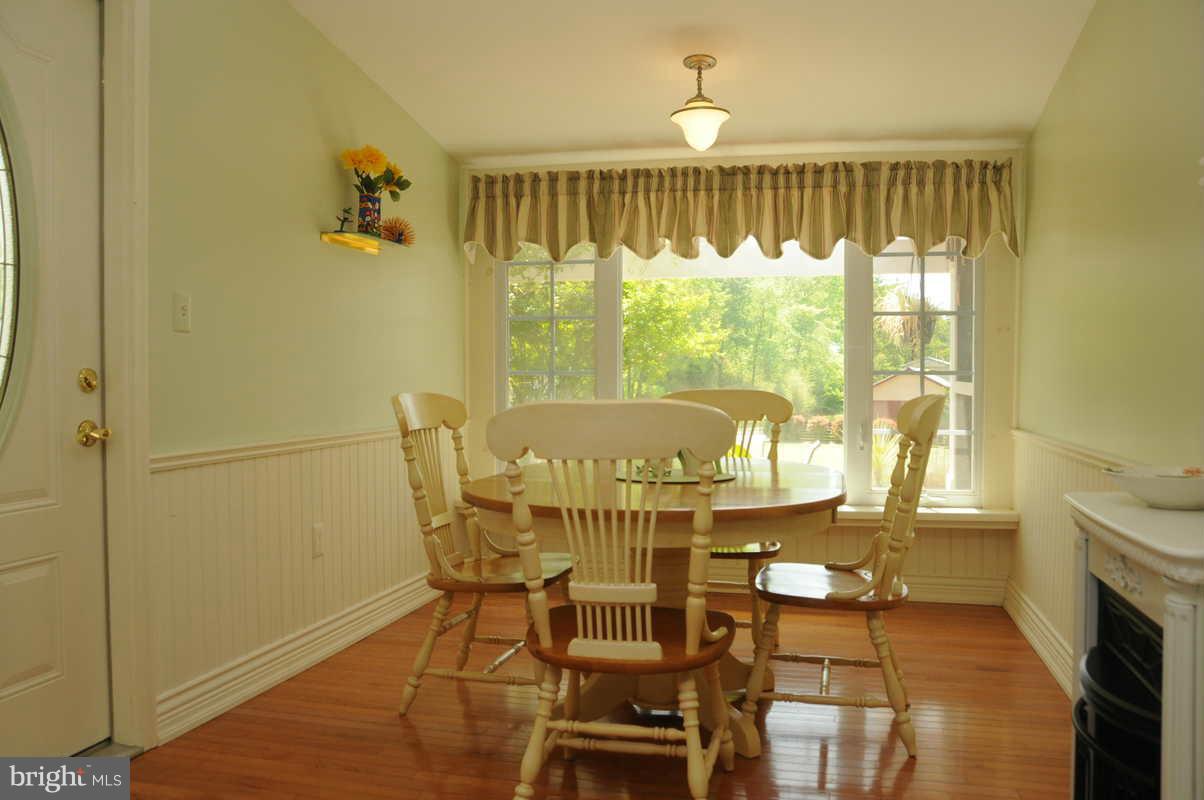 16311 Accolawn Road Accokeek, MD 20607 - Photo 12 of 17 a view of a dining room with furniture window and outside view