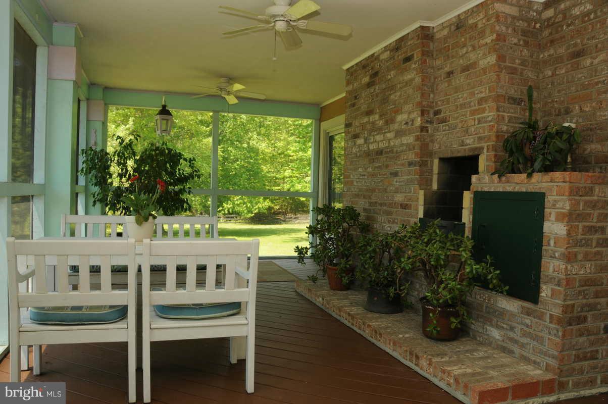 16311 Accolawn Road Accokeek, MD 20607 - Photo 15 of 17 a view of a chairs and table in a balcony