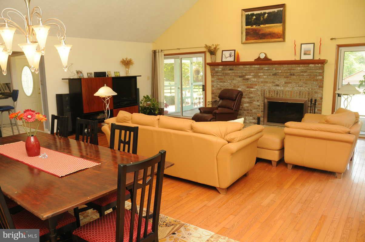 16311 Accolawn Road Accokeek, MD 20607 - Photo 3 of 17 a view of a livingroom with furniture and a fireplace