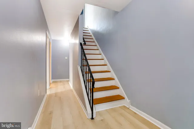 a view of entryway with wooden floor