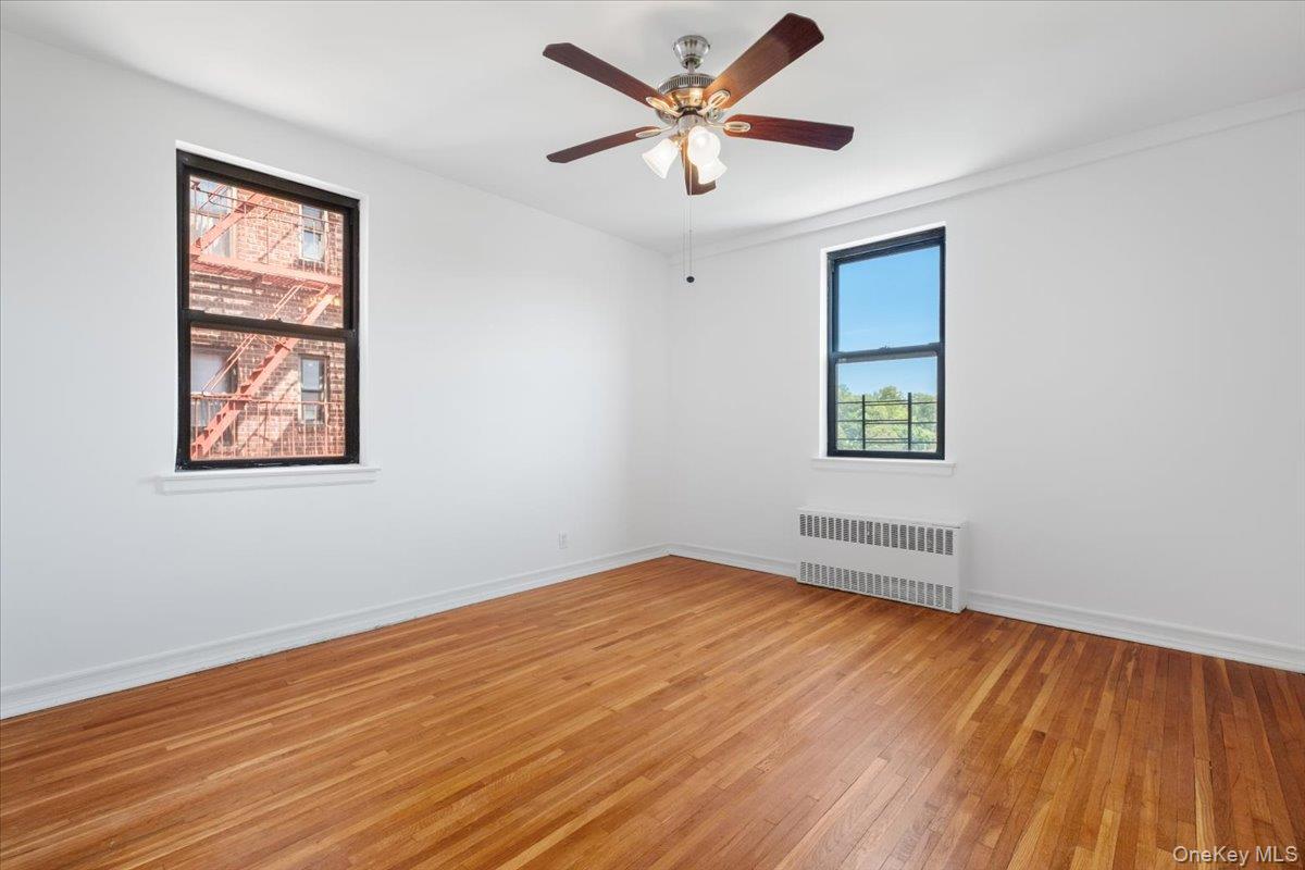 142 Garth Road, Unit 5K Scarsdale, NY 10583 - Photo 15 of 33 Primary bedroom is large and has 2 closets a ceiling fan