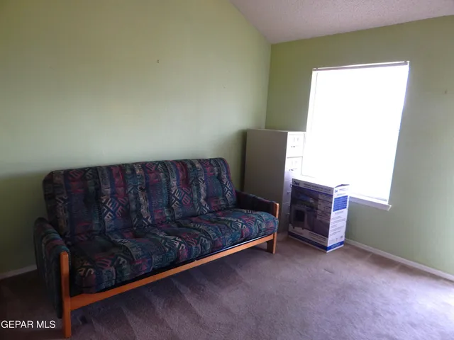 a living room with a couch and a table