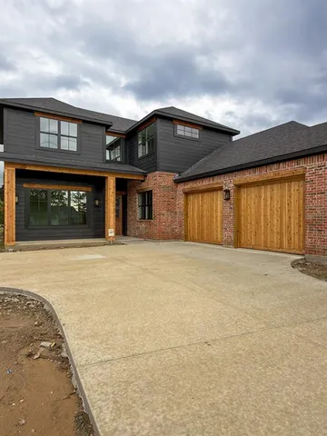 an entrance to house with yard