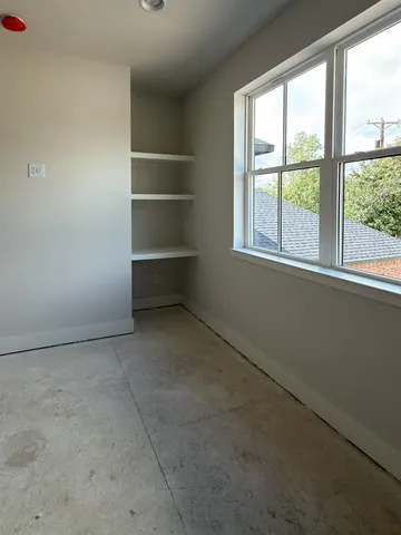 an empty room with a window