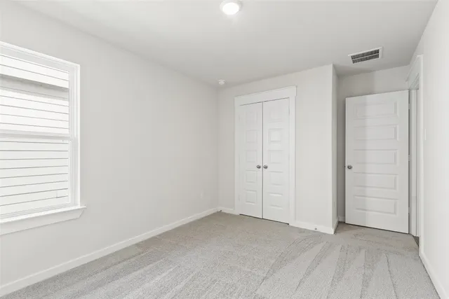 an empty room with window