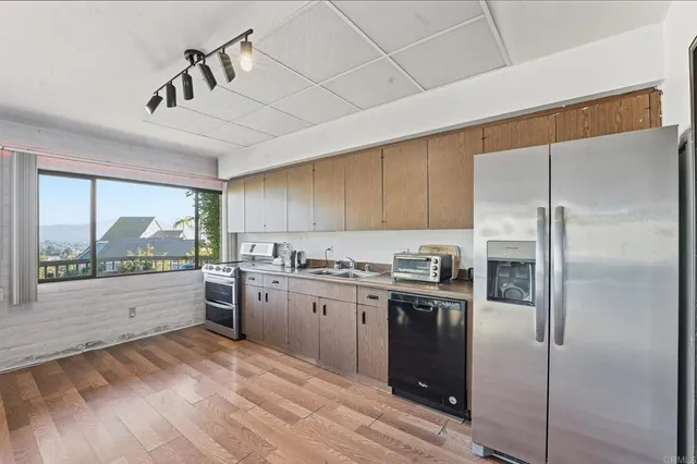 a outdoor dining space with furniture