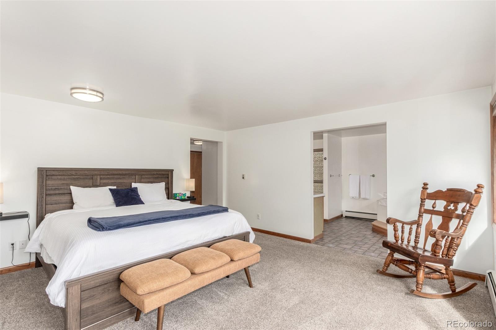 11543 County Road 43 Drake, CO 80515 - Photo 17 of 50 a bedroom with a bed and chair