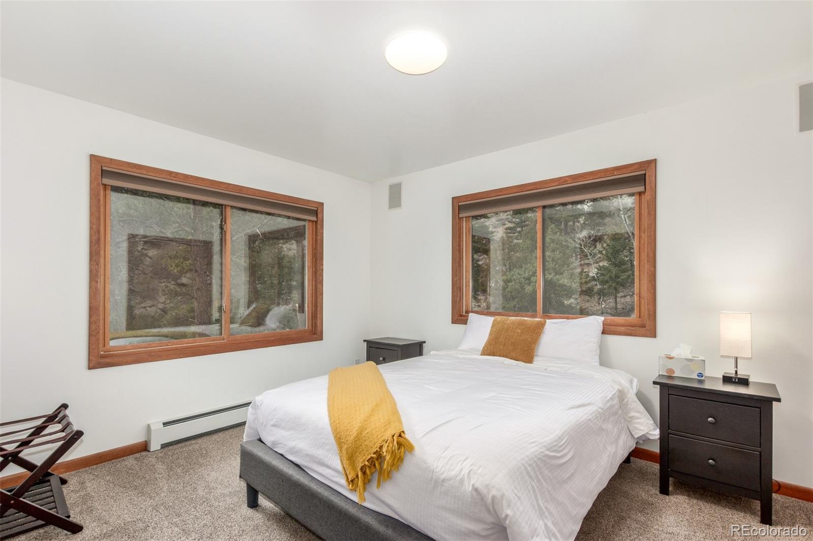 11543 County Road 43 Drake, CO 80515 - Photo 23 of 50 a bedroom with a bed and window