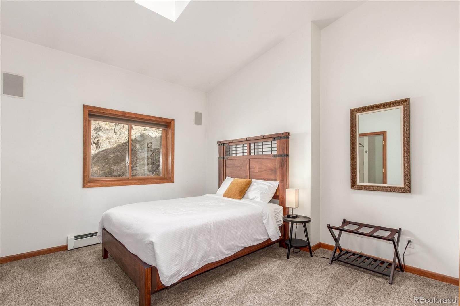 11543 County Road 43 Drake, CO 80515 - Photo 25 of 50 a bedroom with a bed and a window