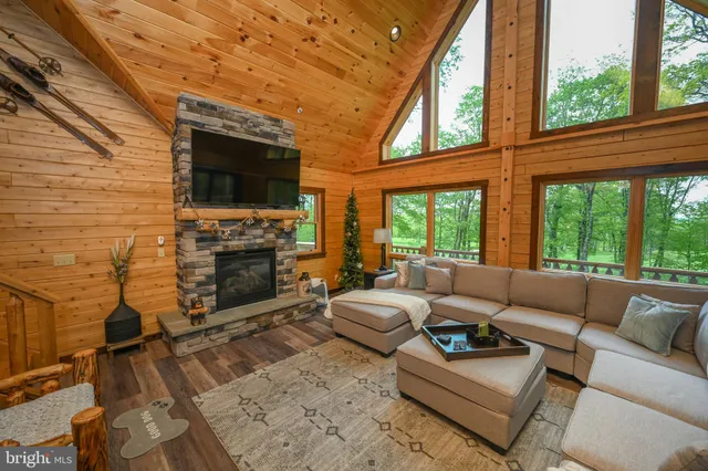 a room with a bed and a flat screen tv