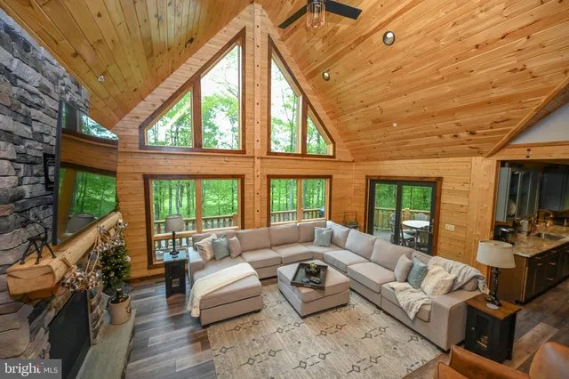 a bedroom with a bed and flat screen tv