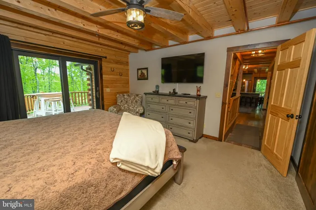 a bathroom with a sink toilet tub and shower