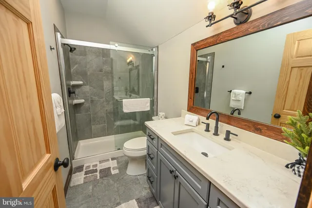 a view of a balcony with chairs