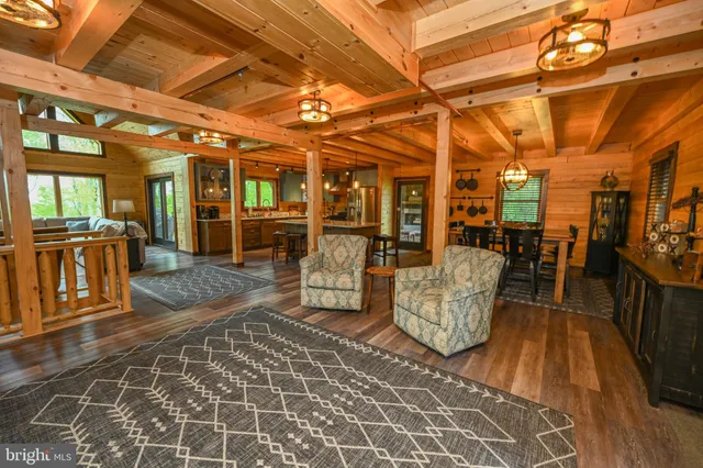 a view of a patio with table and chairs