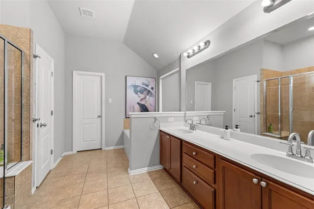 a bathroom with a bathtub and a window