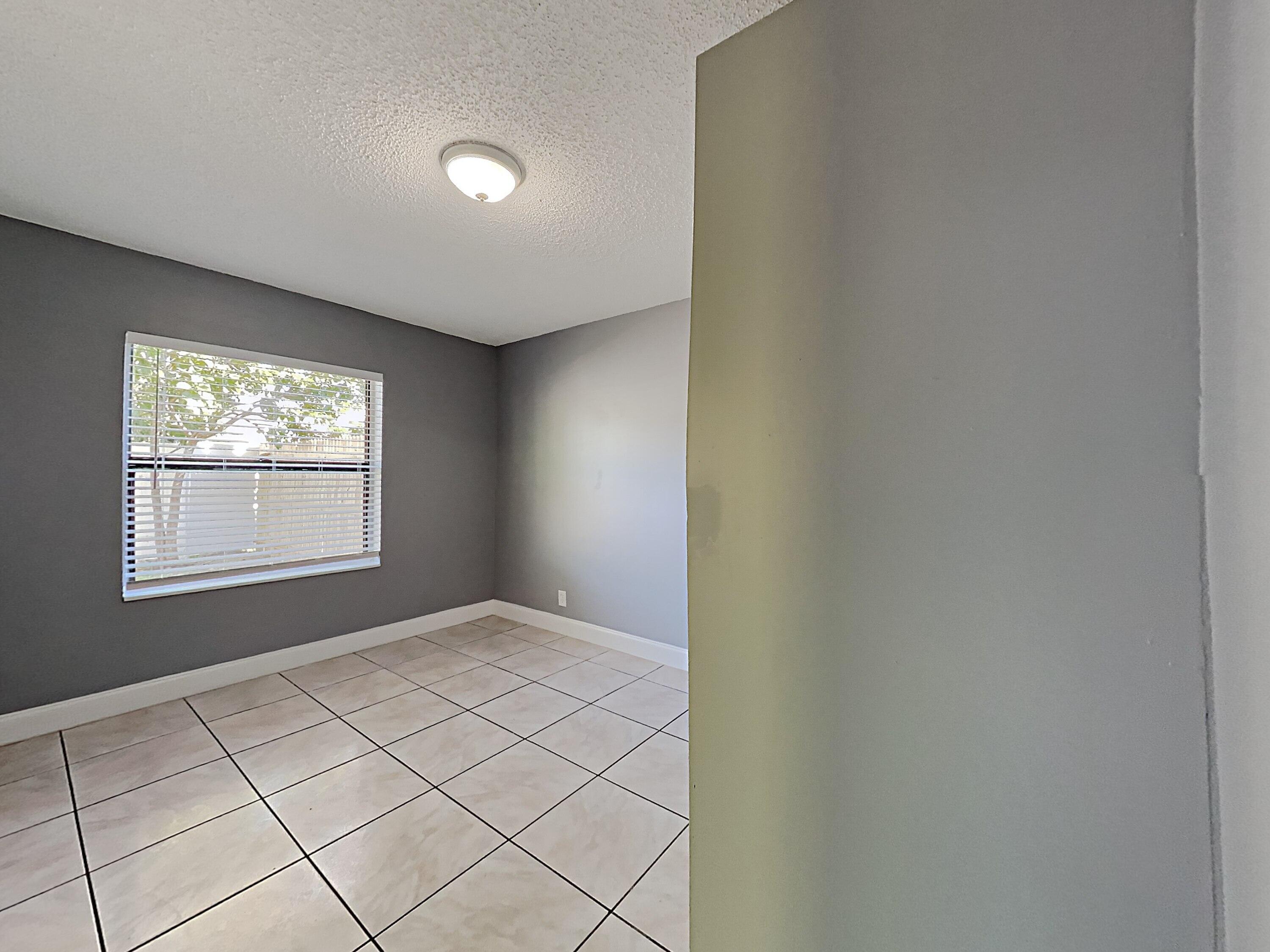 5863 Triphammer Road Lake Worth, FL 33463 - Photo 11 of 19 1002914.5863 Triphammer Rd.Photo_13