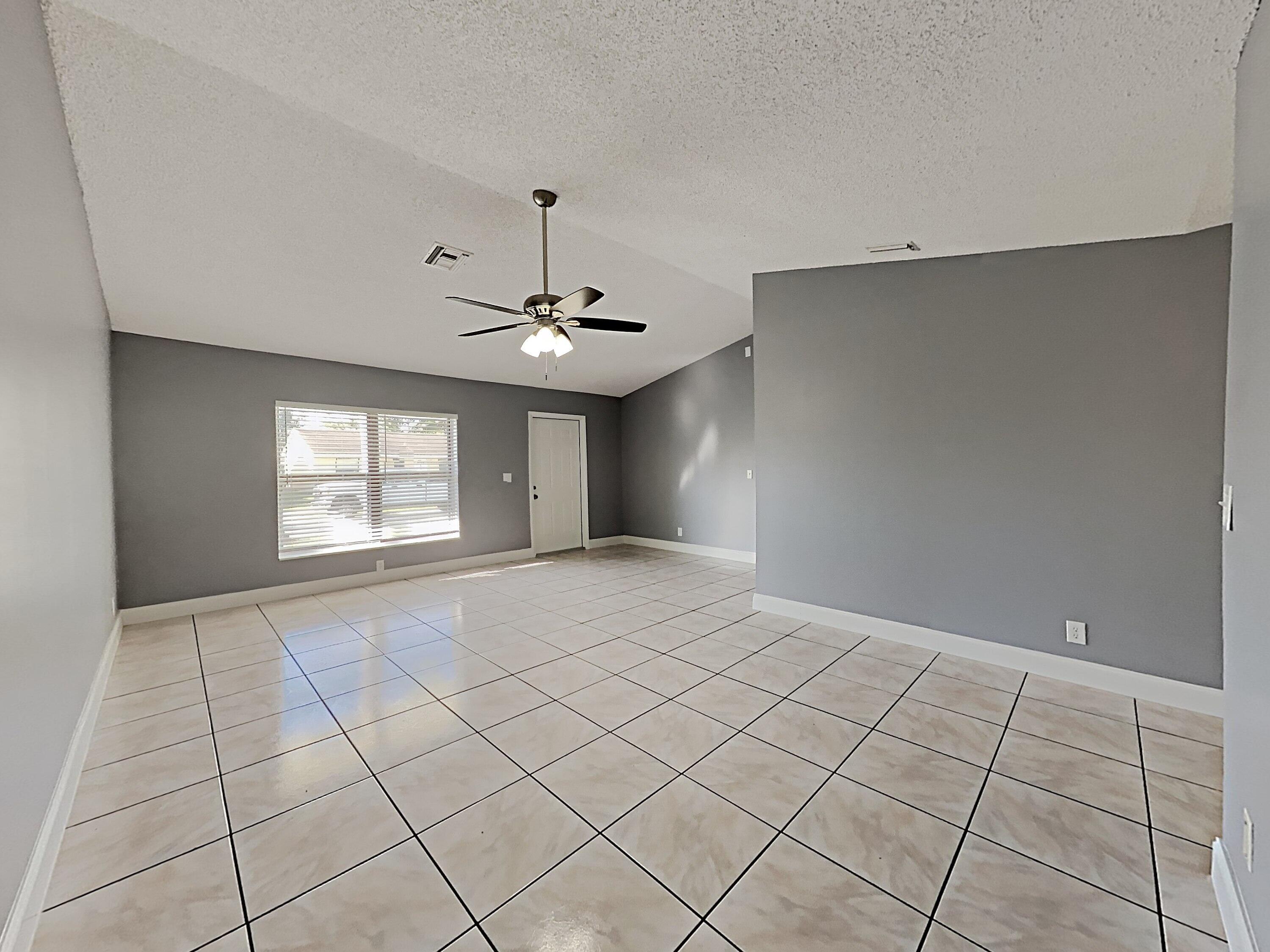 5863 Triphammer Road Lake Worth, FL 33463 - Photo 2 of 19 1002914.5863 Triphammer Rd.Photo_25