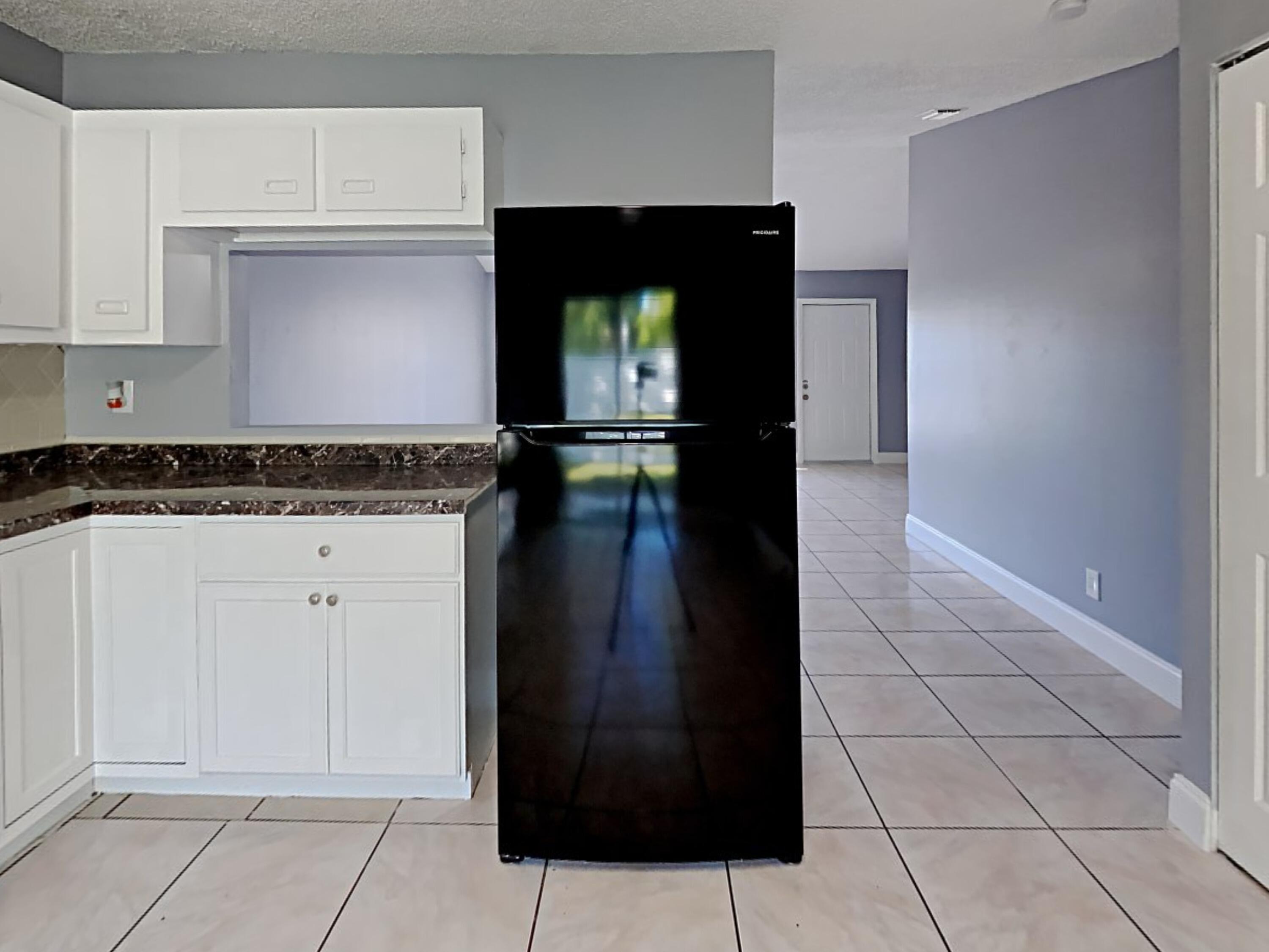 5863 Triphammer Road Lake Worth, FL 33463 - Photo 3 of 19 1002914.5863 Triphammer Rd.Photo_2