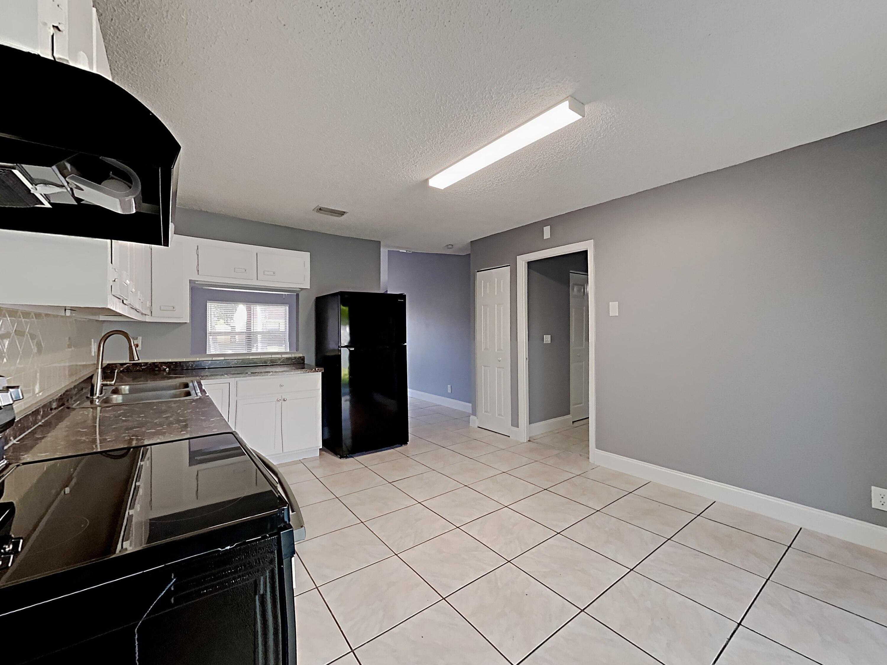 5863 Triphammer Road Lake Worth, FL 33463 - Photo 5 of 19 1002914.5863 Triphammer Rd.Photo_28