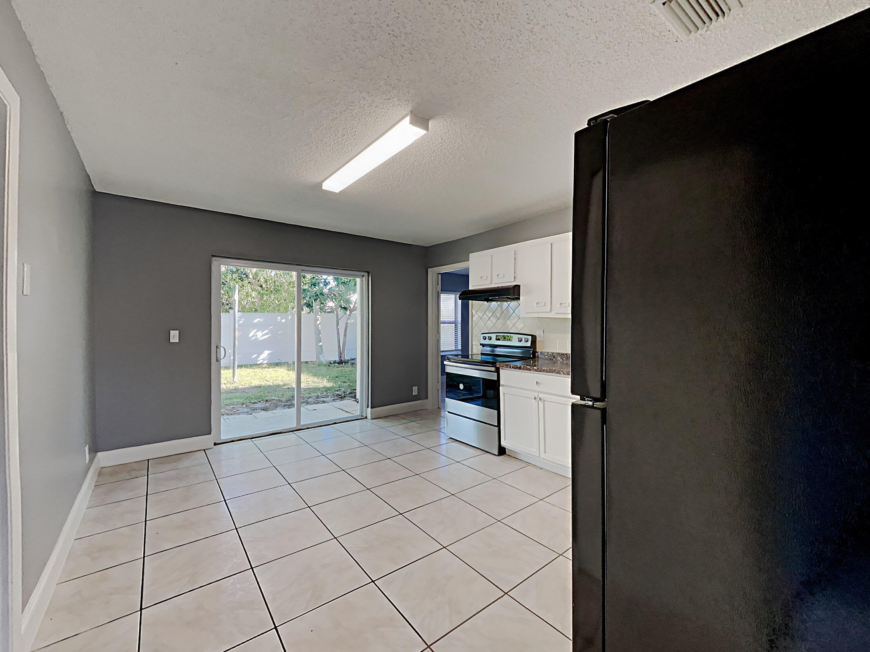 5863 Triphammer Road Lake Worth, FL 33463 - Photo 6 of 19 1002914.5863 Triphammer Rd.Photo_27