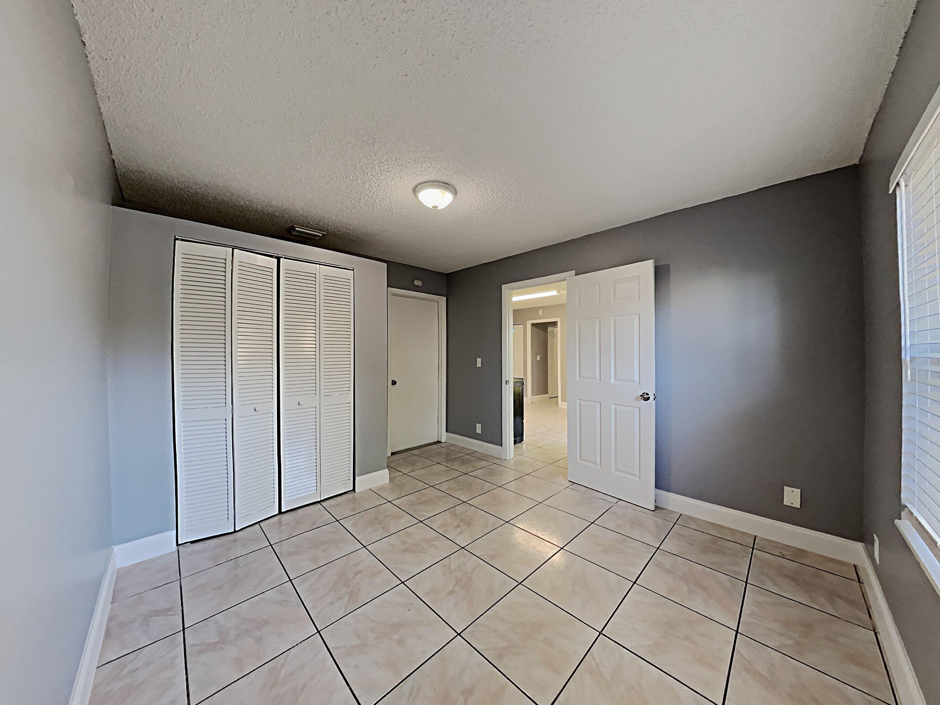 5863 Triphammer Road Lake Worth, FL 33463 - Photo 9 of 19 1002914.5863 Triphammer Rd.Photo_11