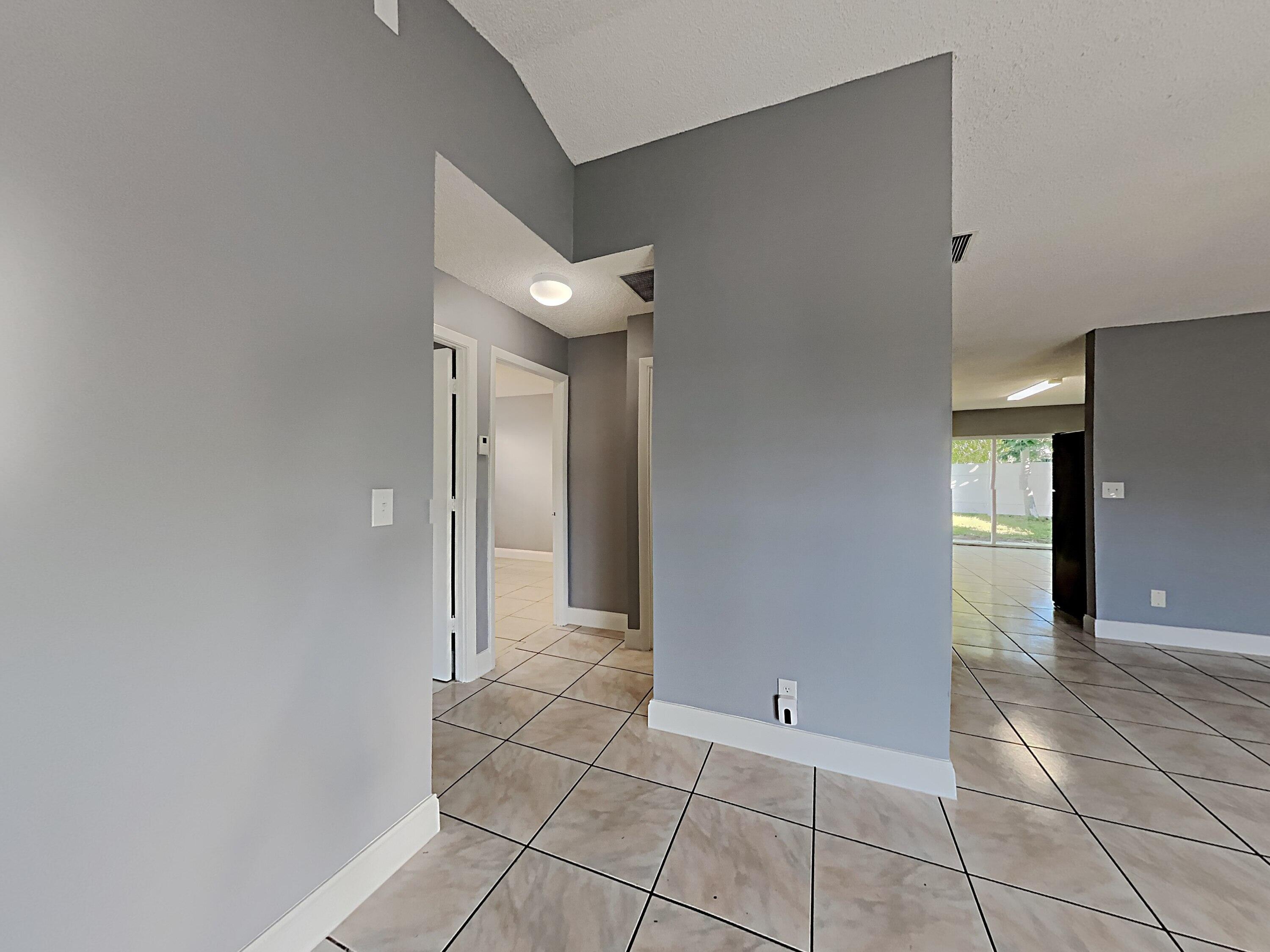 5863 Triphammer Road Lake Worth, FL 33463 - Photo 10 of 19 1002914.5863 Triphammer Rd.Photo_12