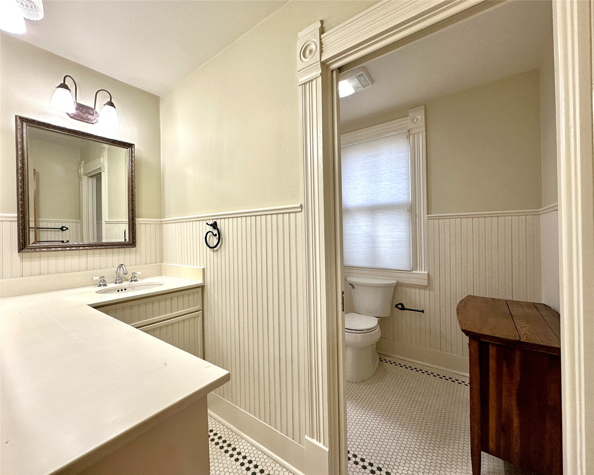 802 Main Street Bastrop, TX 78602 - Photo 12 of 37 a bathroom with a sink a toilet and shower