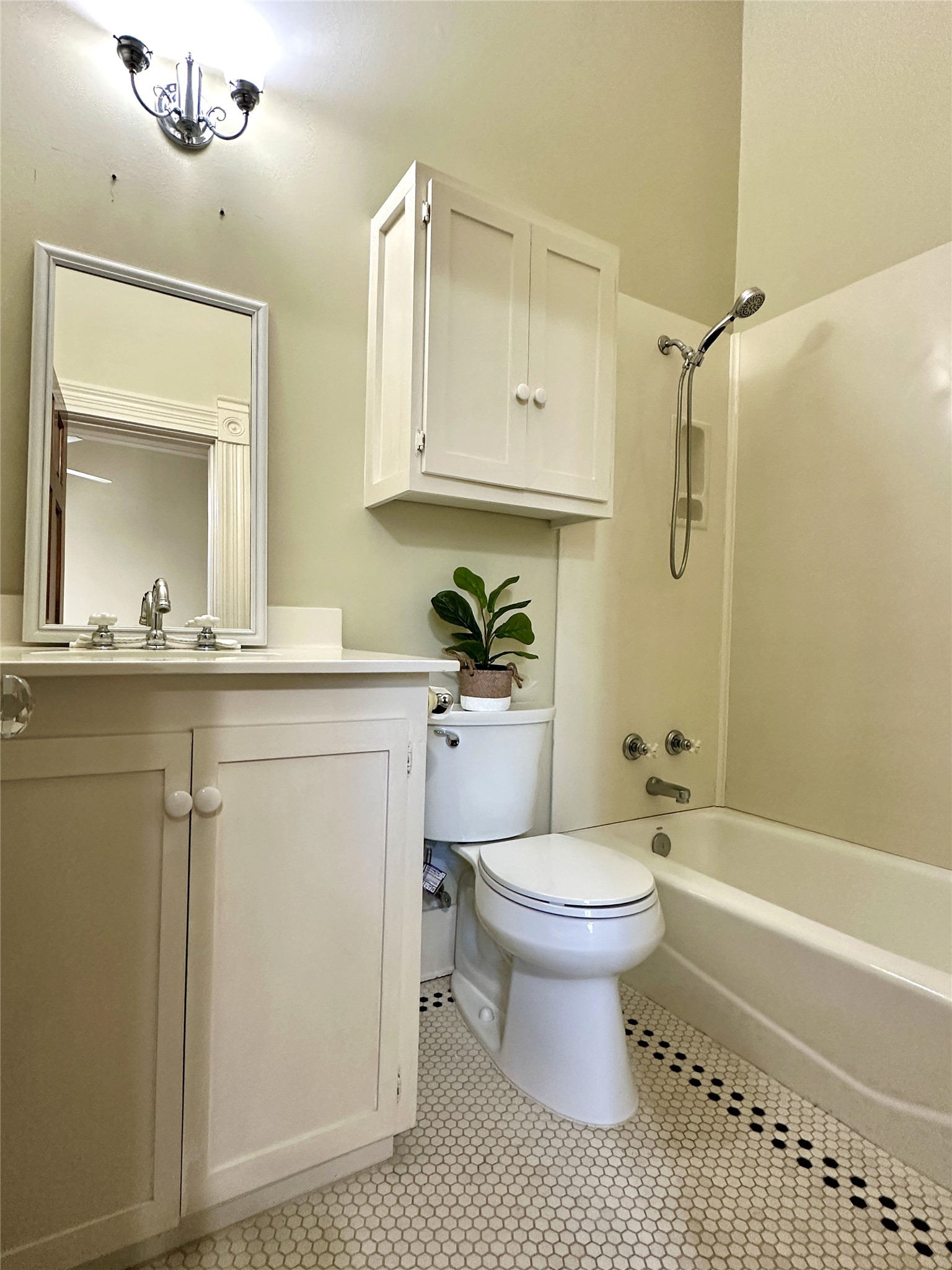 802 Main Street Bastrop, TX 78602 - Photo 16 of 37 a bathroom with a sink a toilet and shower