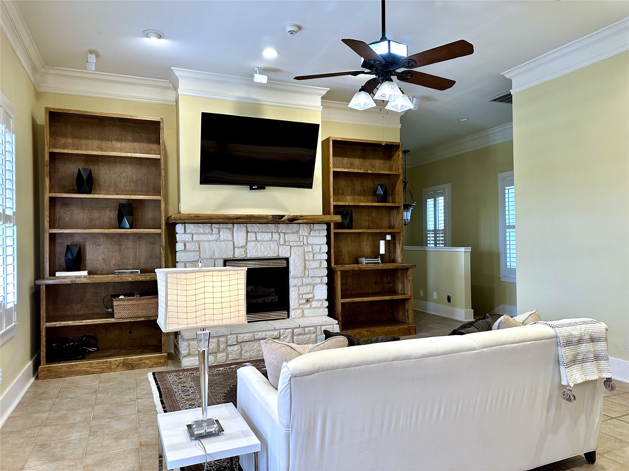 802 Main Street Bastrop, TX 78602 - Photo 20 of 37 a living room with furniture fireplace and flat screen tv
