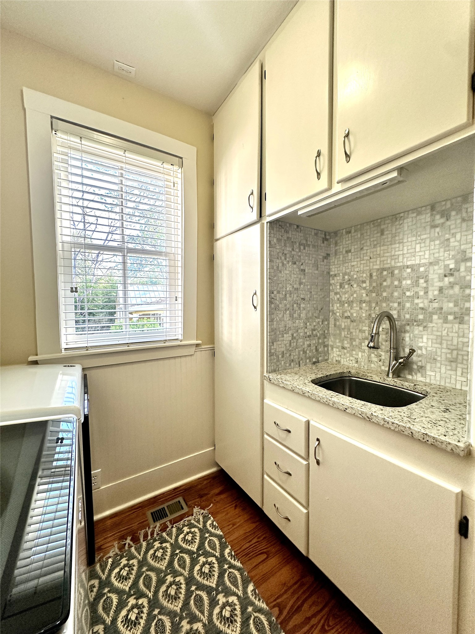 802 Main Street Bastrop, TX 78602 - Photo 21 of 37 a room with a window and washer