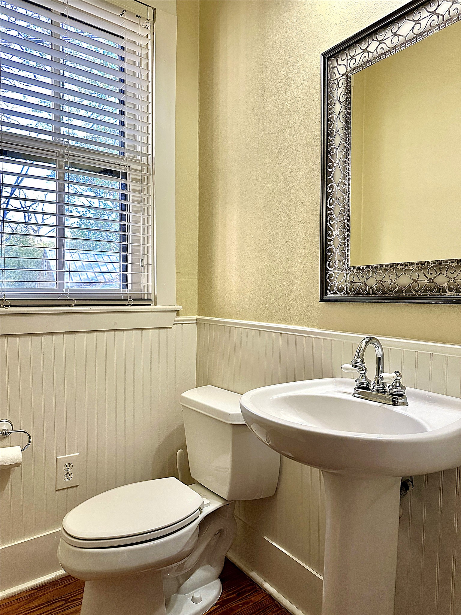 802 Main Street Bastrop, TX 78602 - Photo 22 of 37 a bathroom with a sink and a toilet