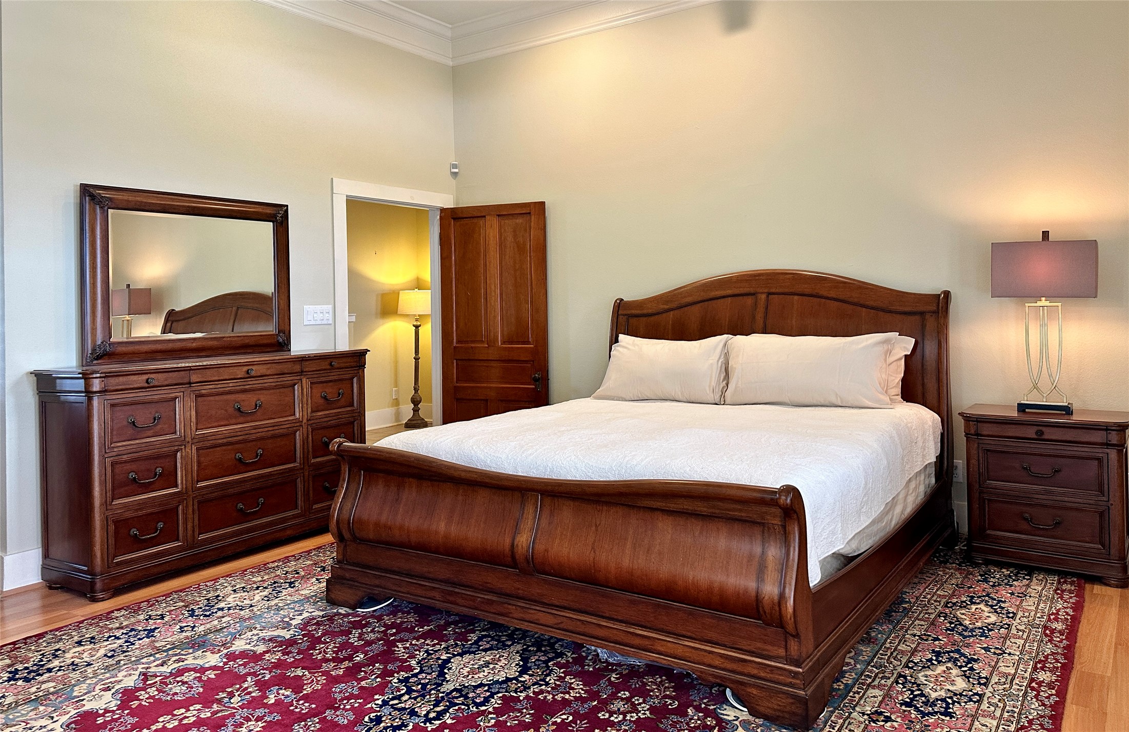 802 Main Street Bastrop, TX 78602 - Photo 23 of 37 a bedroom with a bed and dresser