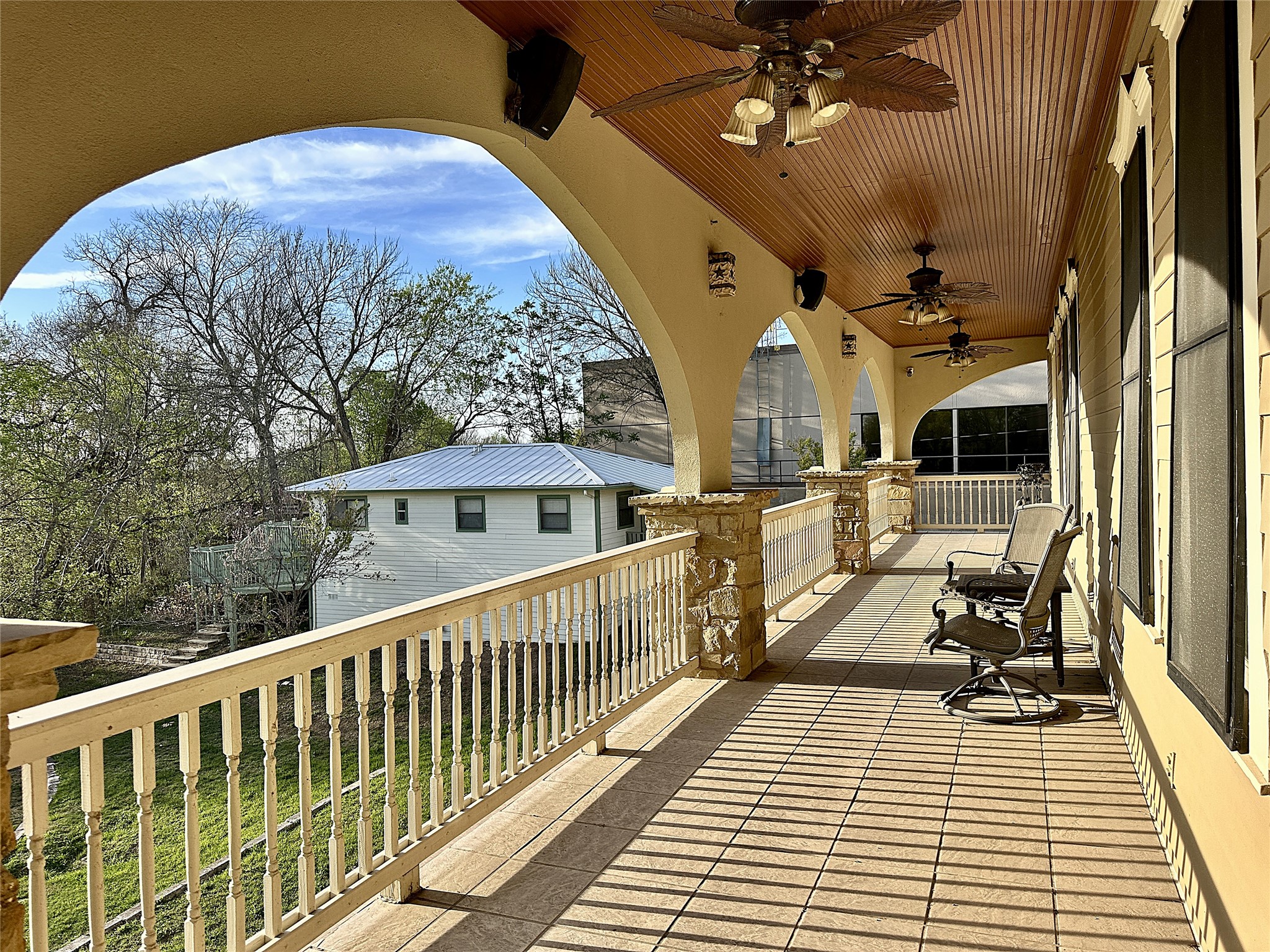802 Main Street Bastrop, TX 78602 - Photo 3 of 37 a view of a balcony with chairs