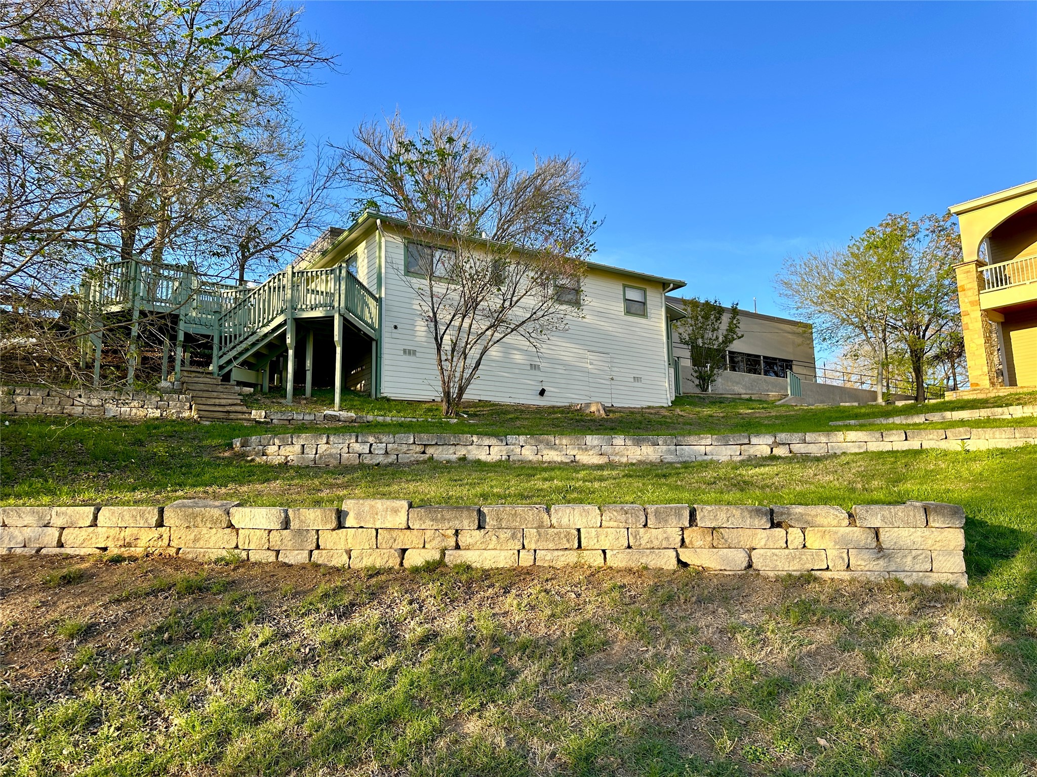 802 Main Street Bastrop, TX 78602 - Photo 31 of 37 a view of a swimming pool with a house