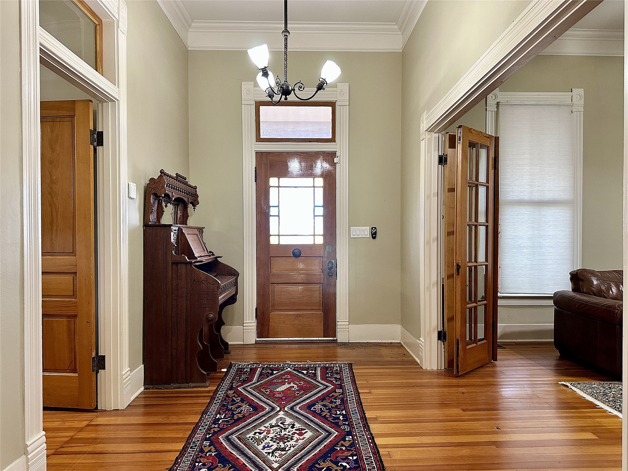 802 Main Street Bastrop, TX 78602 - Photo 9 of 37 a view of a hallway with wooden floor and windows