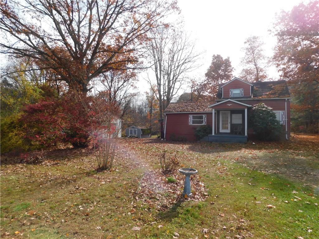 372 Airway Inn Road Uniontown, PA 15401 - Photo 8 of 9 a view of a yard in front of a house with large tree