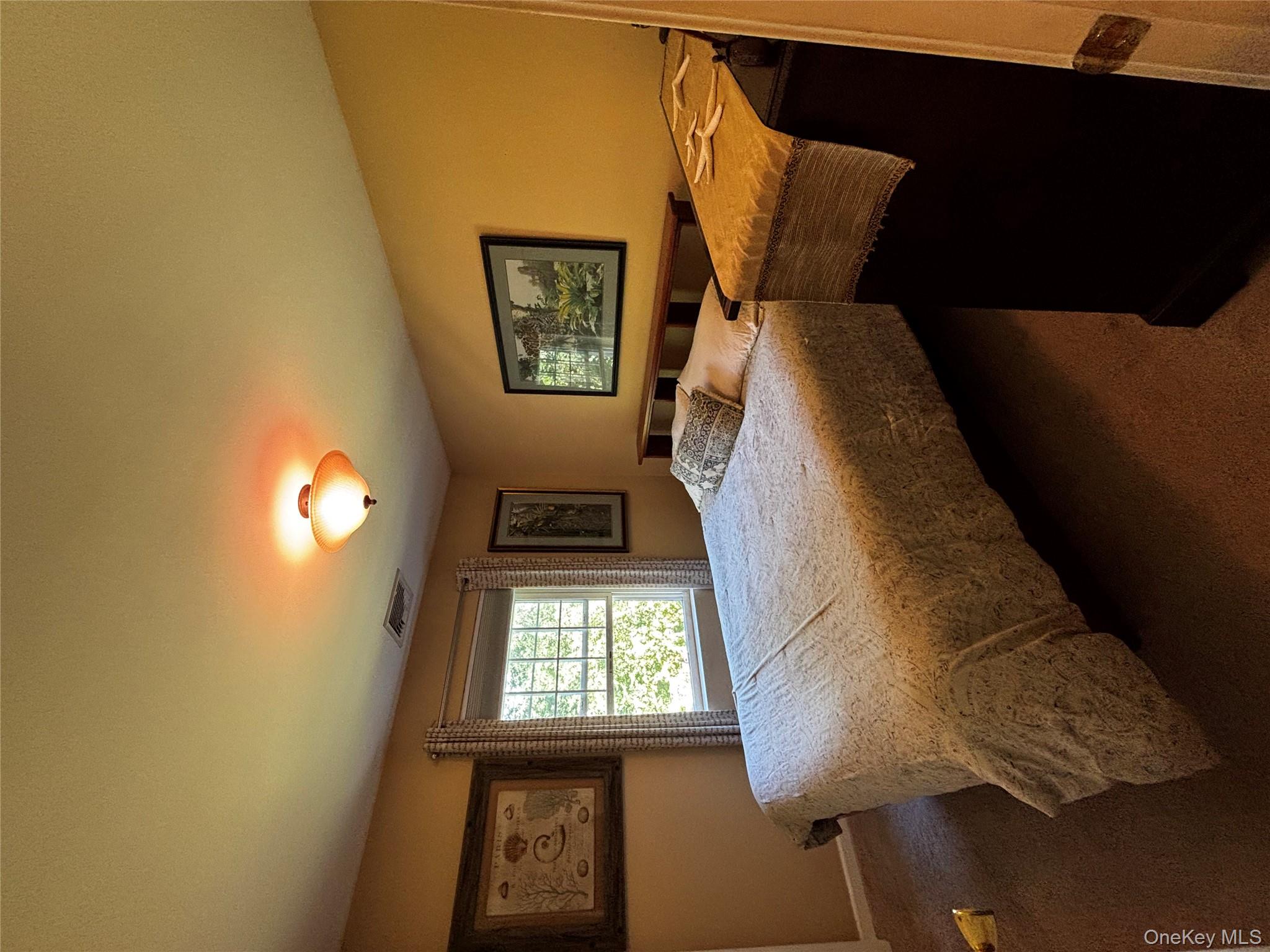 62 Triangle Of Clearwater Road Highland, NY 12528 - Photo 11 of 46 Bedroom featuring dark carpet and baseboards