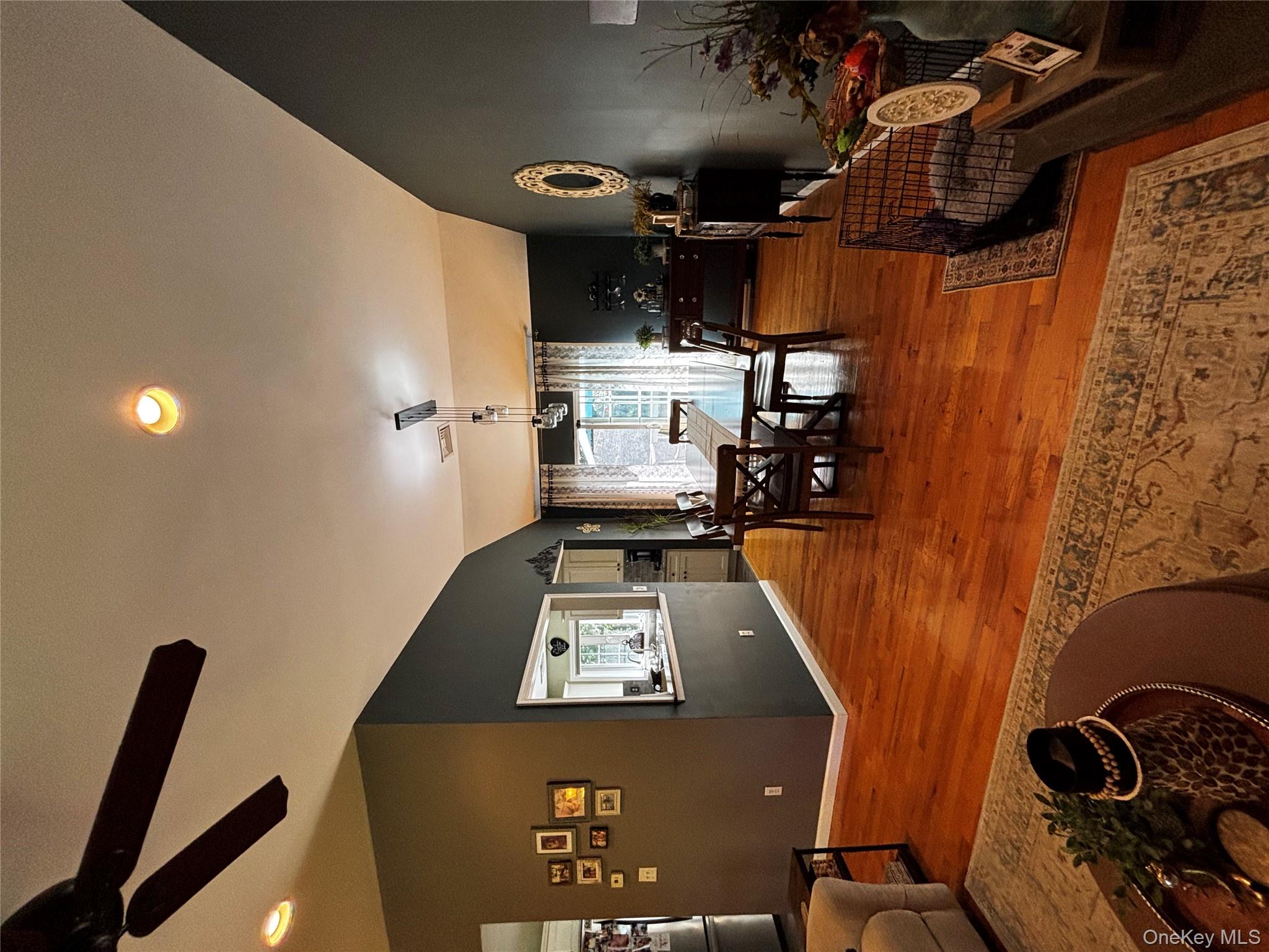 62 Triangle Of Clearwater Road Highland, NY 12528 - Photo 17 of 46 Dining area featuring wood finished floors, vaulted ceiling, a ceiling fan, and recessed lighting