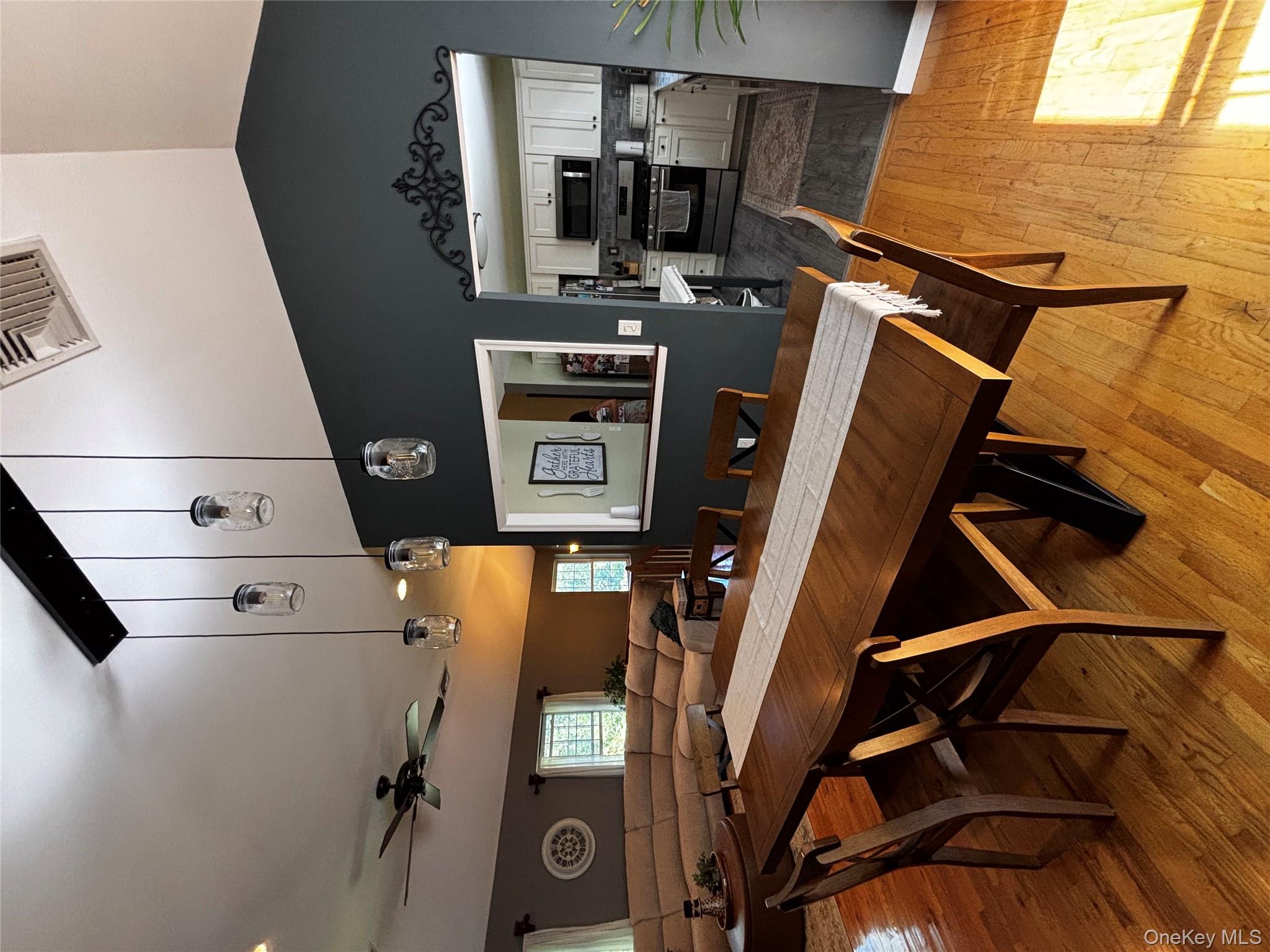 62 Triangle Of Clearwater Road Highland, NY 12528 - Photo 18 of 46 Dining area with vaulted ceiling, light wood-style flooring, a ceiling fan, and recessed lighting