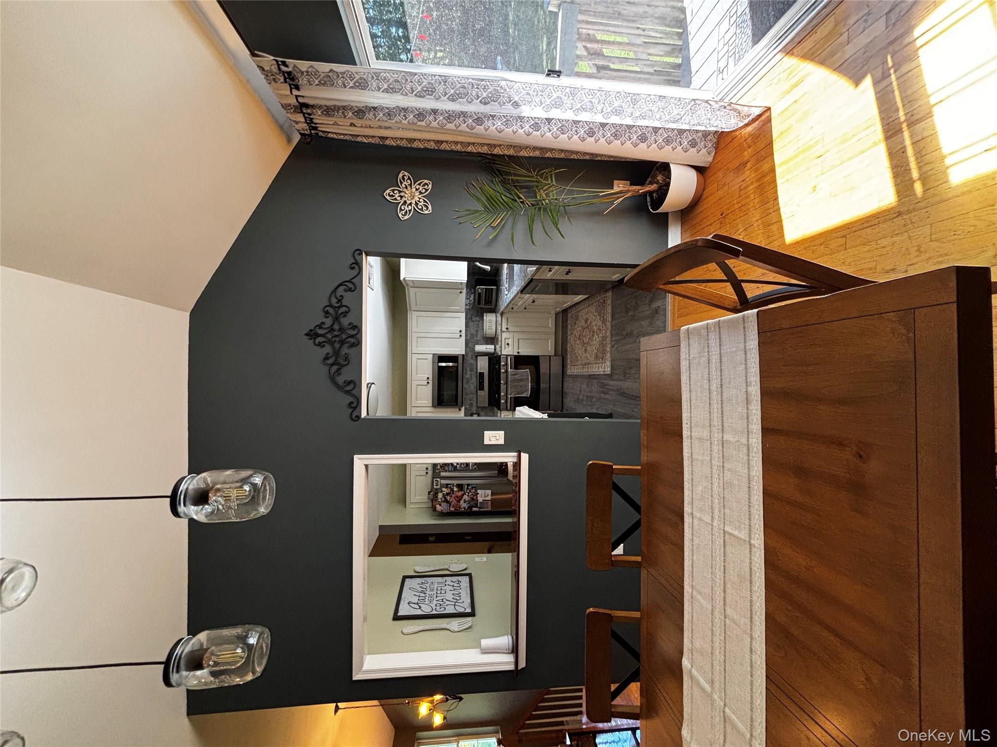 62 Triangle Of Clearwater Road Highland, NY 12528 - Photo 19 of 46 Dining room featuring plenty of natural light, light wood finished floors, and lofted ceiling